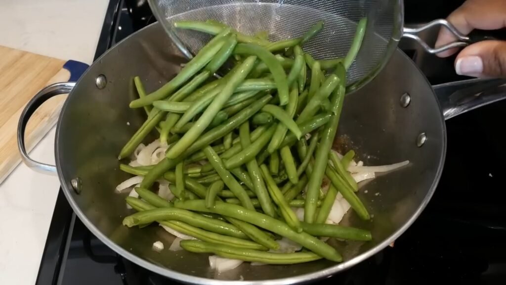 Southern Green Beans with Bacon and Potatoes Adding green beans to the wok