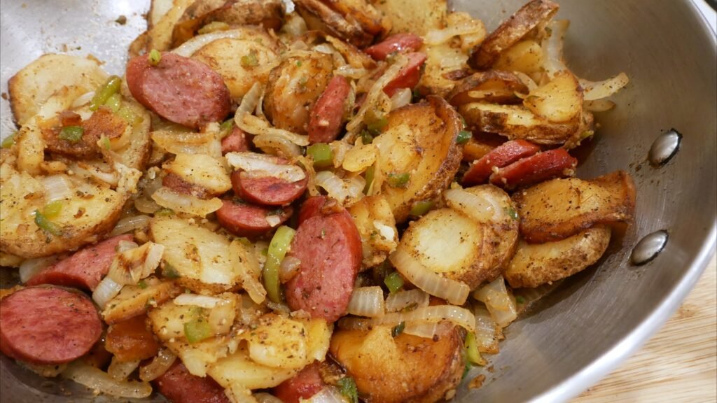 Smothered Skillet Potatoes with Smoked Sausage still 2026 10 02 184125 1.6.1