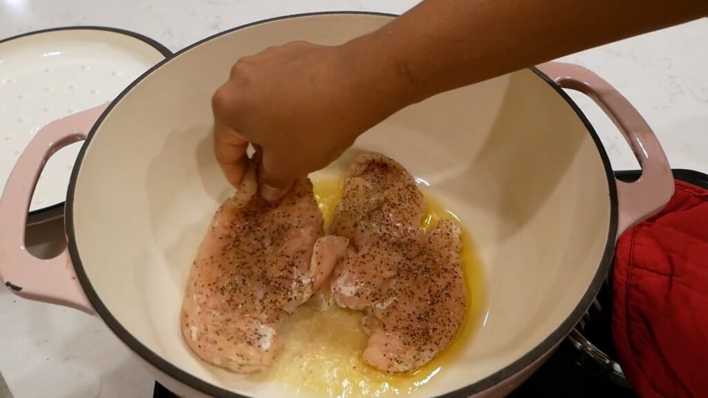 Creamy Tuscan Chicken Searing chicken