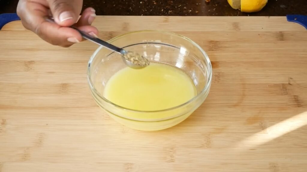 Making the lemon pepper butter sauce