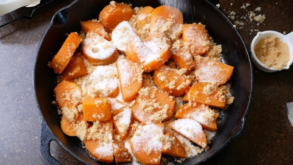 Southern Candied Yams Sliced sweet potatoes layered with brown sugar and cinnamon