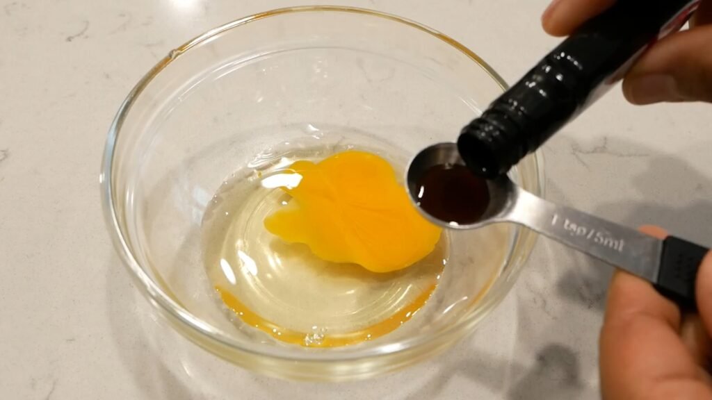 Measuring out the vanilla extract