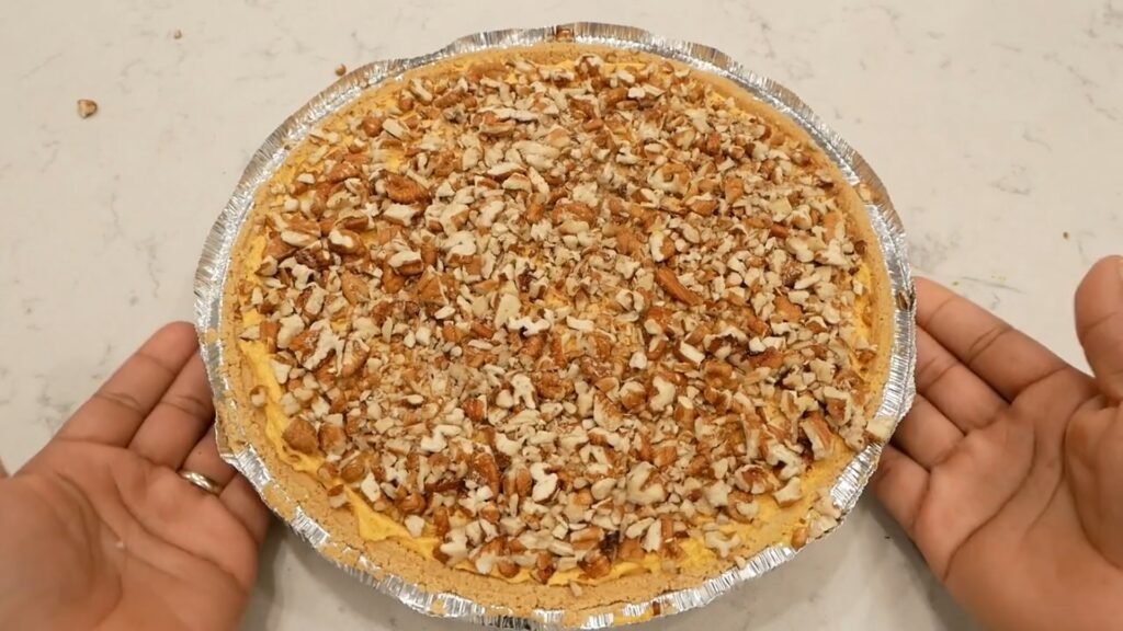 Easy No-Bake Pumpkin Pecan Cheesecake Pumpkin cheesecake topped with pecans