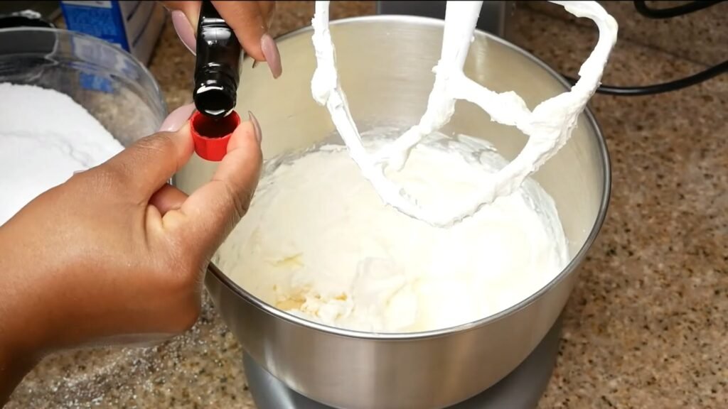 Red Velvet Cupcakes with Cream Cheese Frosting Measuring vanilla extract