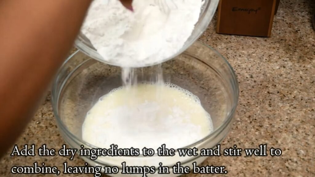 Adding the dry ingredients to the wet ingredients