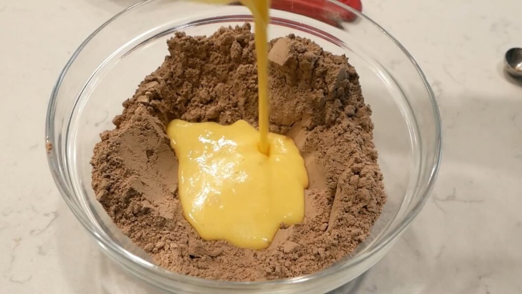 Adding wet ingredients to the dry ingredients