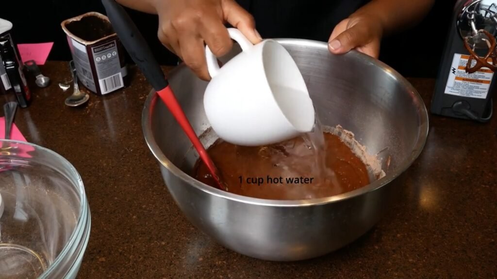 Easy Homemade Chocolate Cake Adding hot water to cake batter