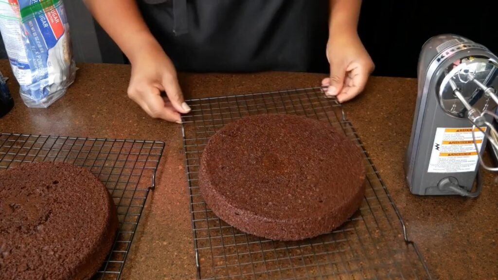 Easy Homemade Chocolate Cake Letting cakes cool on cooling rack