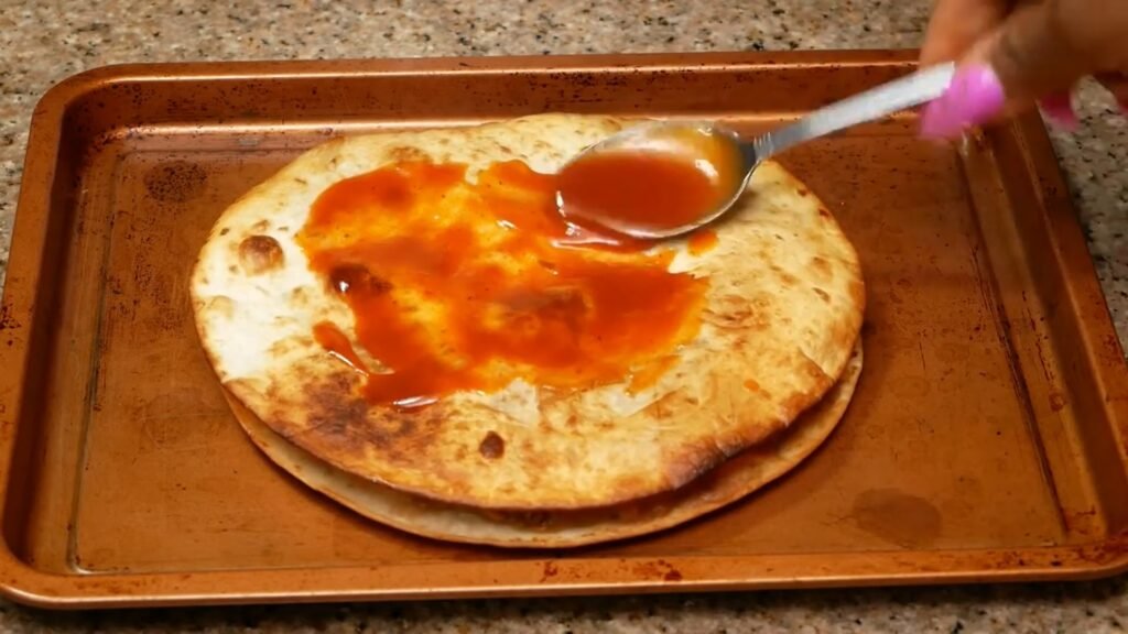 Homemade Mexican Pizza Recipe (Better Than Taco Bell!) Enchilada sauce spread on top