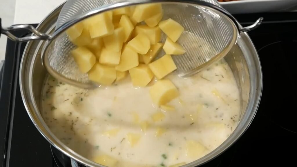 Creamy Potato Soup Recipe Adding the potatoes